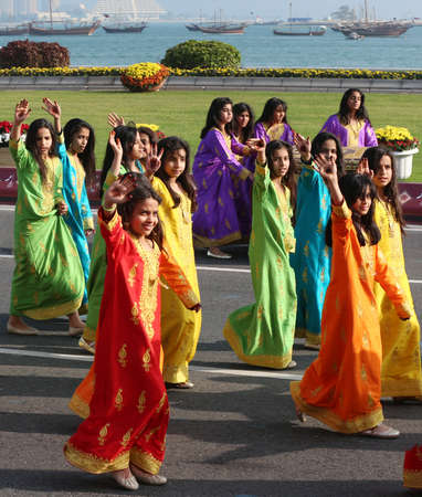 Qatari Girls and boys with traditional dress on Qatar national day celebration  18-12-2020 - QATARのeditorial素材