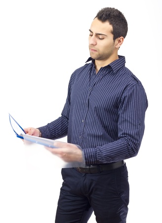 Standing business man reading contract.White background.の写真素材