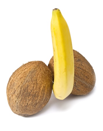 Levitating banana between two coconutsの写真素材