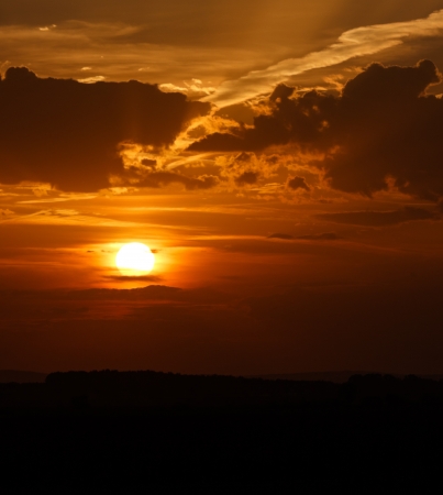 View of beautiful cloudy sunset in autumn season.Can be used as background.の写真素材