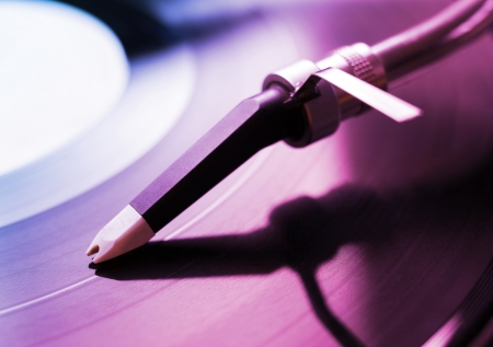 Perspective view of spinning old fashioned turntable. Radiant Orchid is the color of the Year 2014の写真素材
