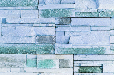 Front view of blue stone wall