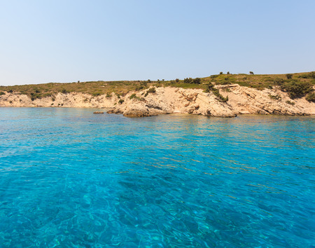 Blue sea water near island during summerの写真素材