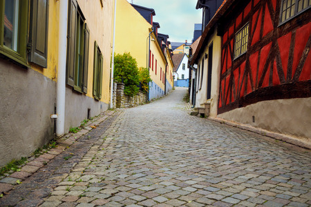 Street with houses and cobblestone in Visby, Gotland, Swedenの写真素材