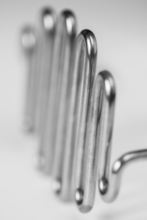 Macro close-up of potato masher with selective focus in black and whiteの写真素材