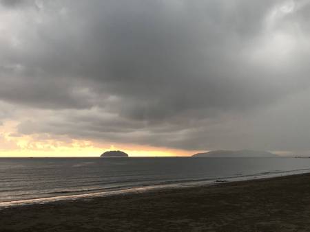 Sunset by the seaの写真素材