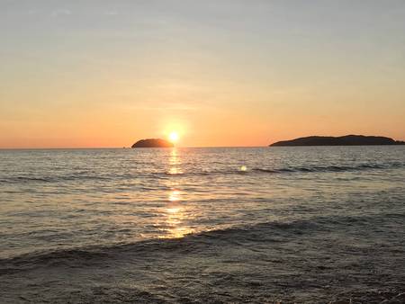 Sunset by the seaの写真素材