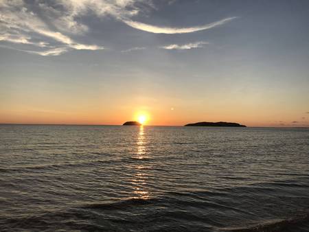 Sunset by the seaの写真素材