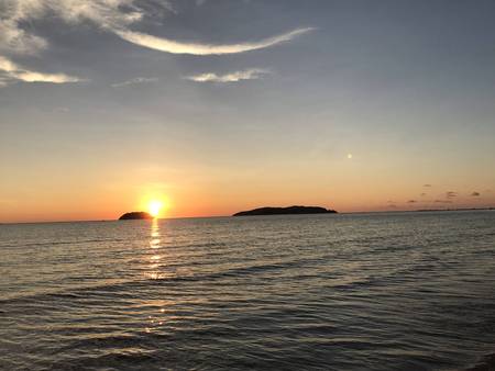 Sunset by the seaの写真素材