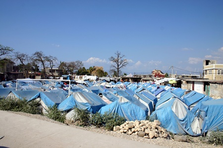 Port au Prince, Haiti, March 12, 2011 - over a year after the earthquake still too many tents to count surrounded by major devastation and poverty. Very poor living conditions. のeditorial素材