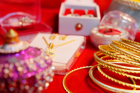Indian wedding Jewellery sets on red cloth background.の写真素材