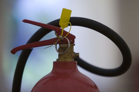 close up abstract image of fire extinguisher looking at shape