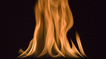 image of red hot fire frozen in time against a black background