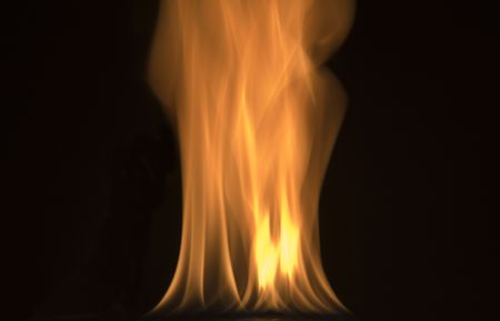 image of red hot fire frozen in time against a black background
