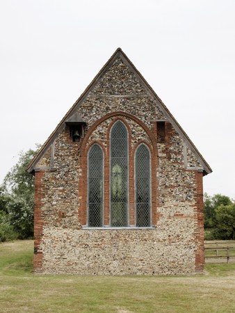 small old stone chapel back end view of St Nicholas' Chapel in essex uk
の写真素材