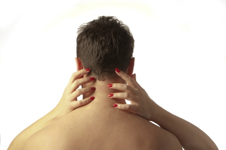 mans naked bear back with womans hands around him with red nails