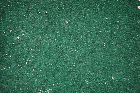 close up detail shot, looking down at a well used piece of sand paper の写真素材