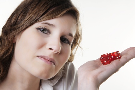 person holding to dice in there handの写真素材