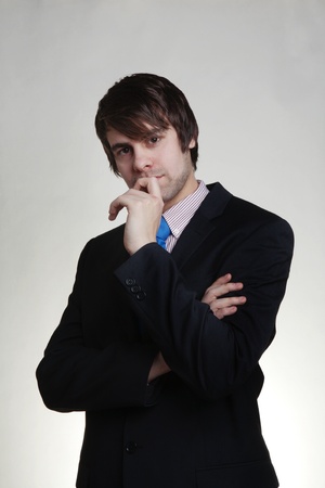 business man thinking looks deep in thoughtの写真素材