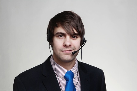 happy man with a headset on cant wait to hear from you の写真素材