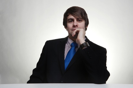 business man thinking looks deep in thoughtの写真素材