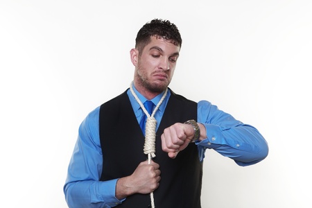 handsome man with hangman noose around his neckの写真素材