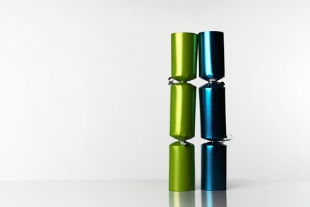 christmas crackers on white reflective background stand up rightの写真素材