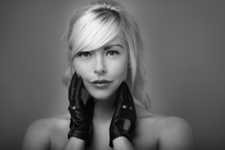 sexy woman wearing leather driving glovesの写真素材