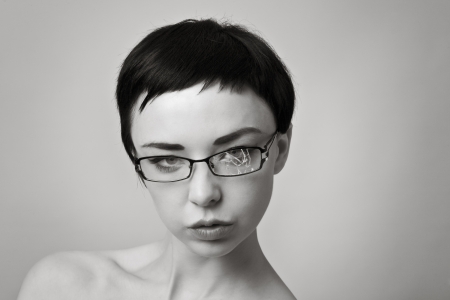 sexy woman wearing broken glassesの写真素材