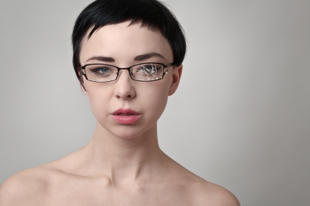 sexy woman wearing broken glassesの写真素材