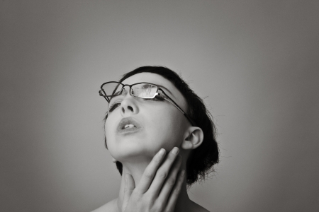 sexy woman wearing broken glassesの写真素材