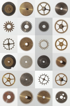 small watch cogs looking down from above backgroundの写真素材