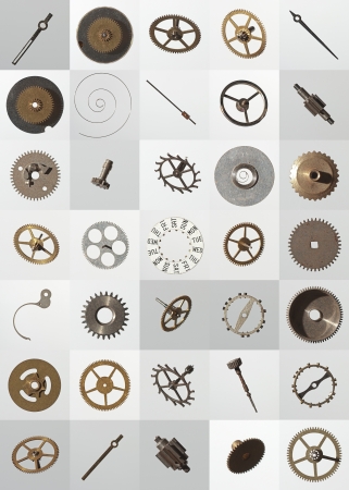 small watch cogs and other parts, looking down from above backgroundの写真素材