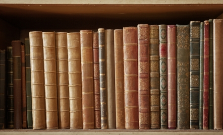 bookcase with many old books in a  libraryの写真素材