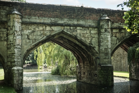 Bridge arch over river on a summers dayの写真素材