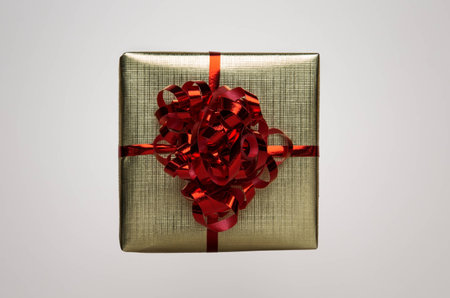 Small gift box with a ribbon around the box