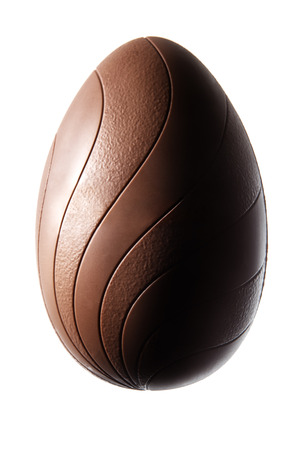 single chocolate easter egg on white の写真素材