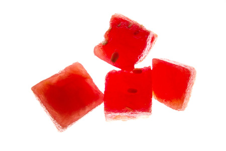 watermelon pieces, cut out shot on white background lit from bellowの写真素材