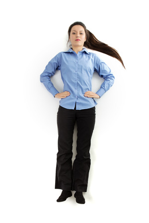 shot from above with the model lying on the ground as if she is jumping in the airの写真素材