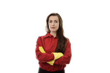 woman with arms crossed wearing rubber gloves for cleaning or washing upの写真素材