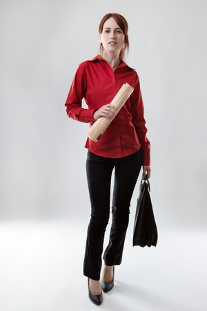 standing business woman shot in the studioの写真素材