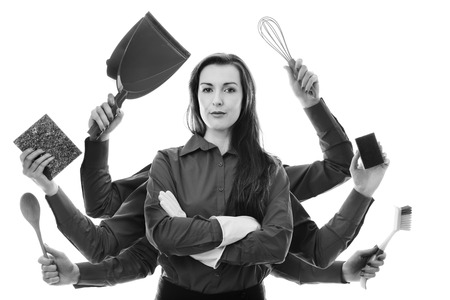 woman with many arms holding different objects in each hand to clean up withの写真素材