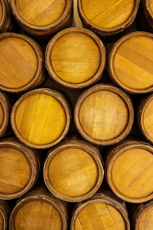 Stack of gun powder barrels backgroundの写真素材