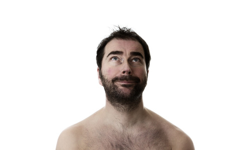 Portrait of a man with two weeks of facial hair growthの写真素材