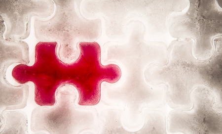 background made up from ice in the shape of jigsaw pieces