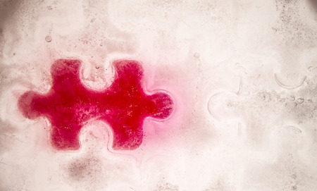 background made up from ice in the shape of jigsaw pieces
