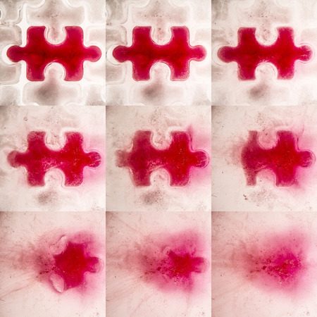 background made up from ice in the shape of jigsaw piecesの写真素材