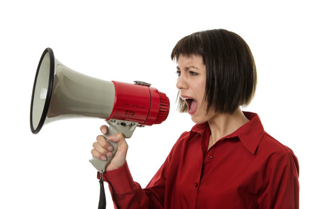 business woman calling out with a  loudspeakerの写真素材
