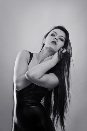 black and white image of sex woman wearing latexの写真素材