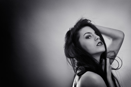 black and white image of sex woman wearing latexの写真素材